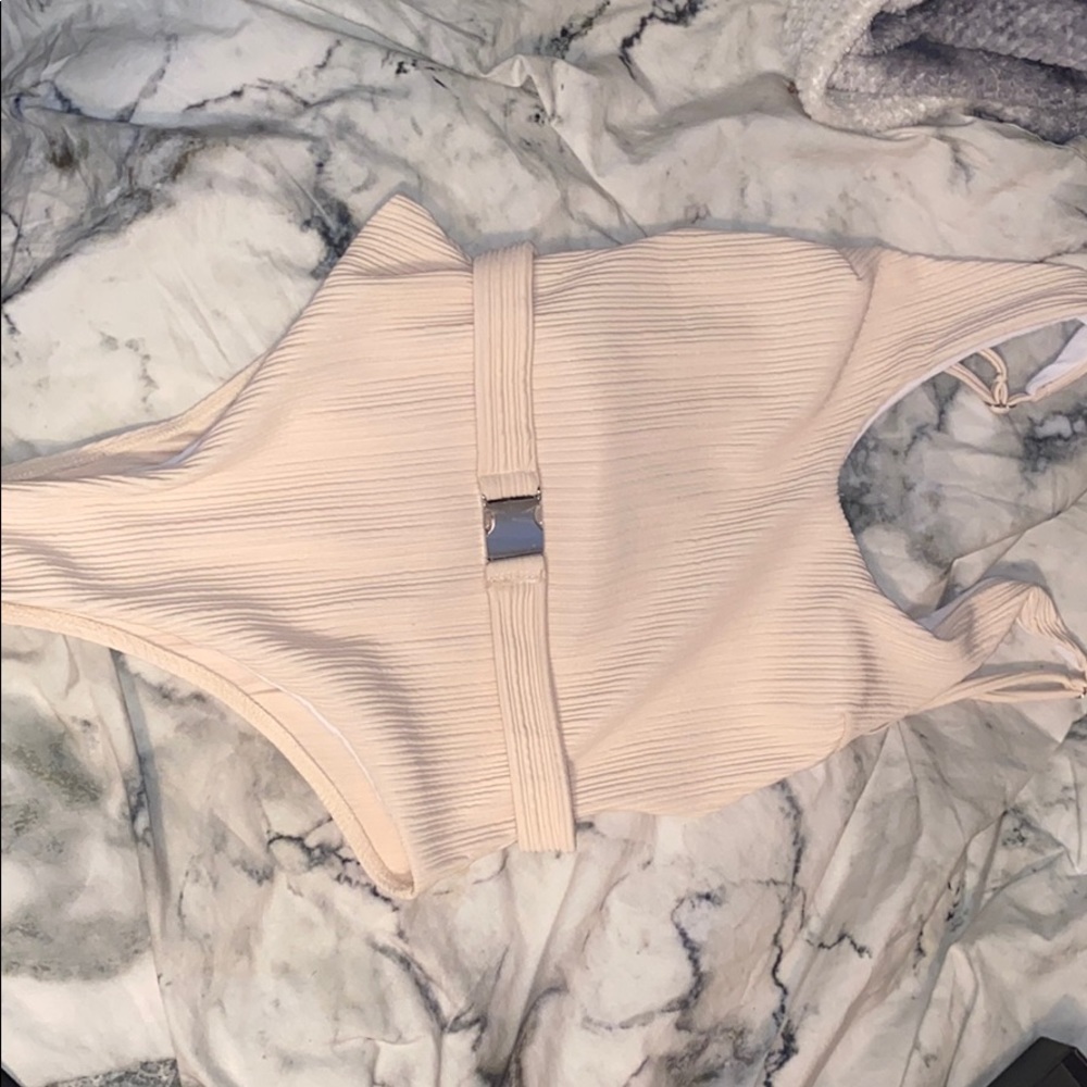 Never worn, swim suit